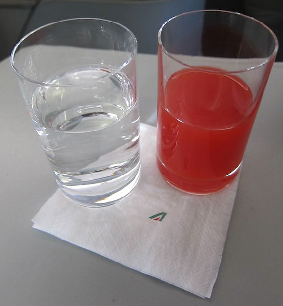 Water and orange juice pre-departure drinks